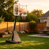 Portable basketball basket with adjustable height of 4.9-10 feet, equipped with a refillable base and ball storage, suitable for home gyms